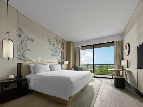 Imagen de la habitación del Hotel Garrya Yangcheng Lake. Foto 19