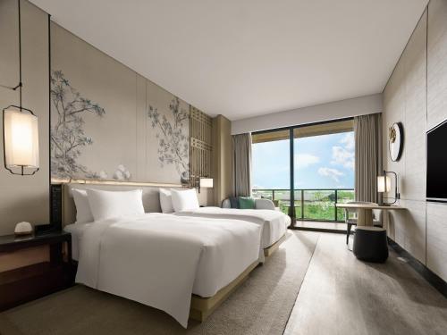 Imagen de la habitación del Hotel Garrya Yangcheng Lake. Foto 20