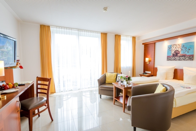Imagen de la habitación del Hotel Gartenhotel Heusser. Foto 2