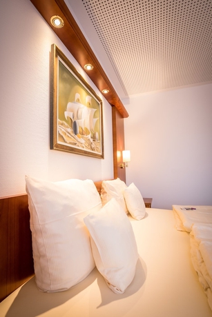 Imagen de la habitación del Hotel Gartenhotel Heusser. Foto 5