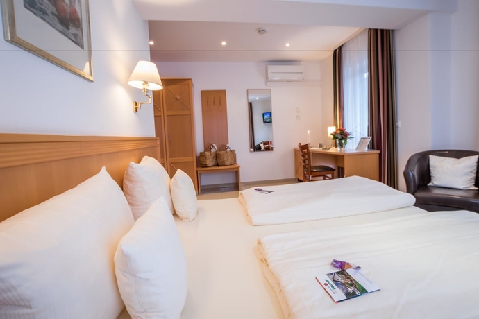 Imagen de la habitación del Hotel Gartenhotel Heusser. Foto 6