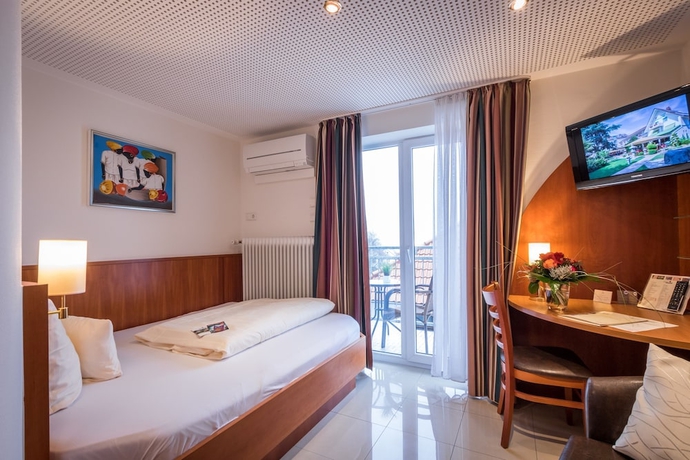 Imagen de la habitación del Hotel Gartenhotel Heusser. Foto 8