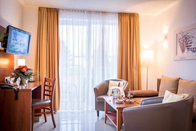 Imagen de la habitación del Hotel Gartenhotel Heusser. Foto 10