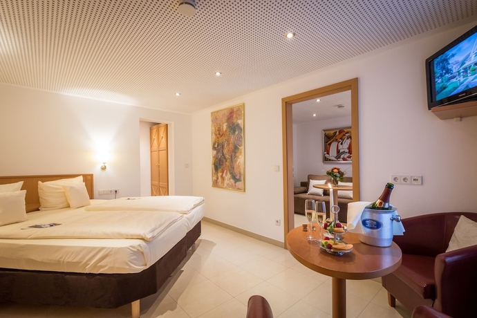 Imagen de la habitación del Hotel Gartenhotel Heusser. Foto 14
