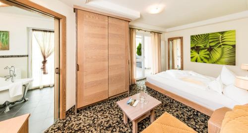 Imagen de la habitación del Hotel Gartenhotel Moser. Foto 6