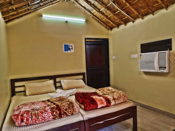 Imagen de la habitación del Hotel Garud Chatti River Resort. Foto 8