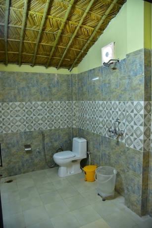 Imagen de la habitación del Hotel Garud Chatti River Resort. Foto 10