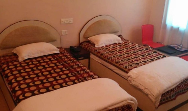 Imagen de la habitación del Hotel Garv Residencia Gaya. Foto 9