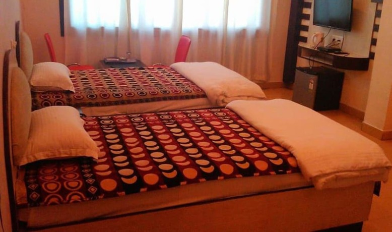 Imagen de la habitación del Hotel Garv Residencia Gaya. Foto 16