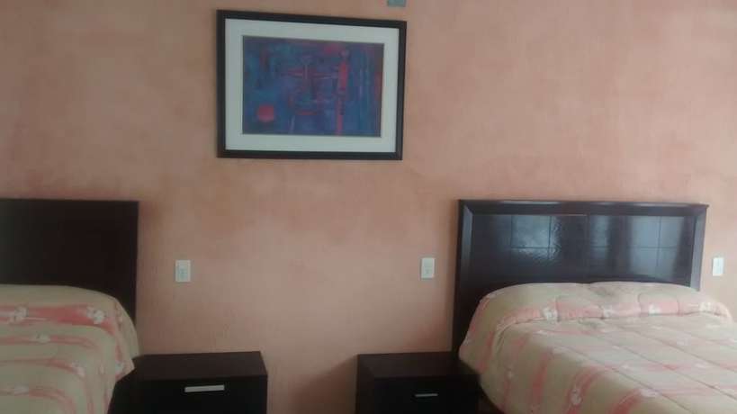 Imagen de la habitación del Hotel Garza Canela. Foto 8