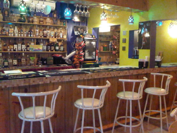 Imagen del bar/restaurante del Hotel Gascon Villas. Foto 1