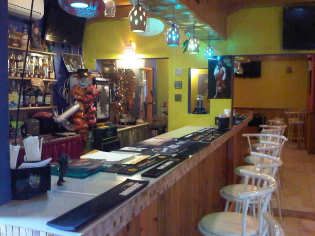 Imagen del bar/restaurante del Hotel Gascon Villas. Foto 2