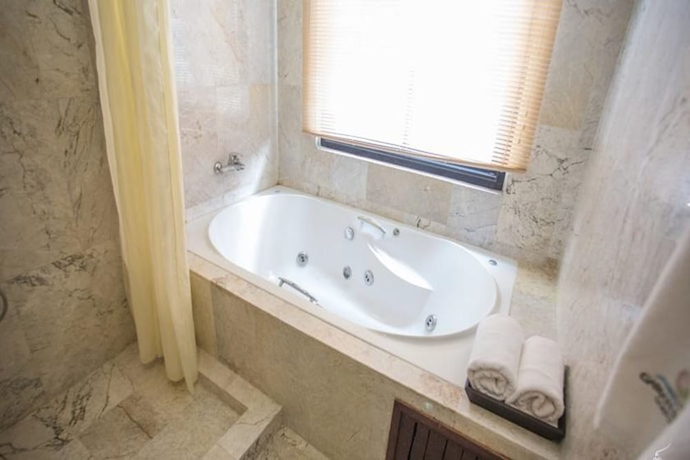 Imagen de la habitación del Hotel Gassan Legacy Golf Club. Foto 18