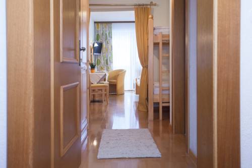 Imagen de la habitación del Hotel Gasthaus-pension Golfvilla. Foto 8