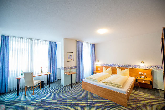 Imagen del bar/restaurante del Hotel Gasthof B&auml;ren Ochsenfurt. Foto 5