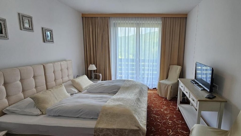 Imagen de la habitación del Hotel Gasthof Gutmann. Foto 7