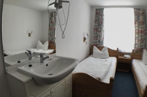 Imagen de la habitación del Hotel Gasthof Inselgraben Garni. Foto 10