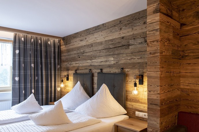 Imagen de la habitación del Hotel Gasthof Pension Wulfenia. Foto 5