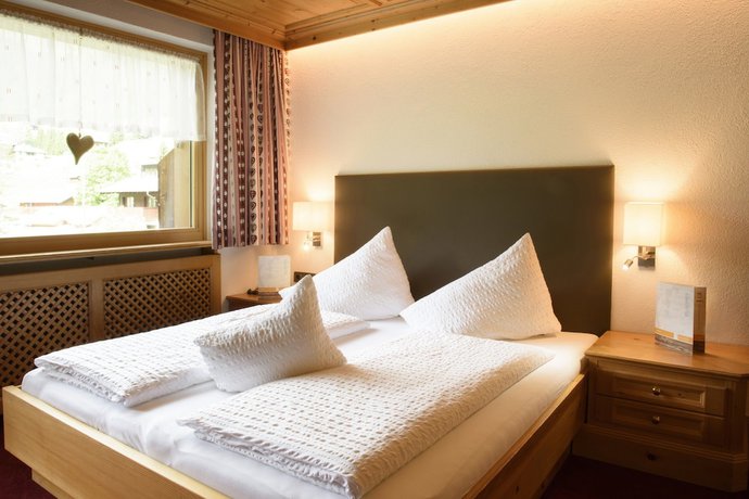 Imagen de la habitación del Hotel Gasthof Pension Wulfenia. Foto 7