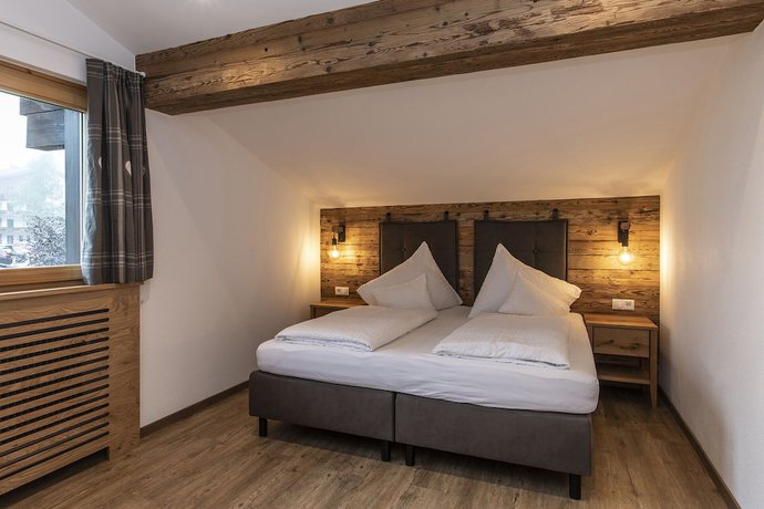 Imagen de la habitación del Hotel Gasthof Pension Wulfenia. Foto 10