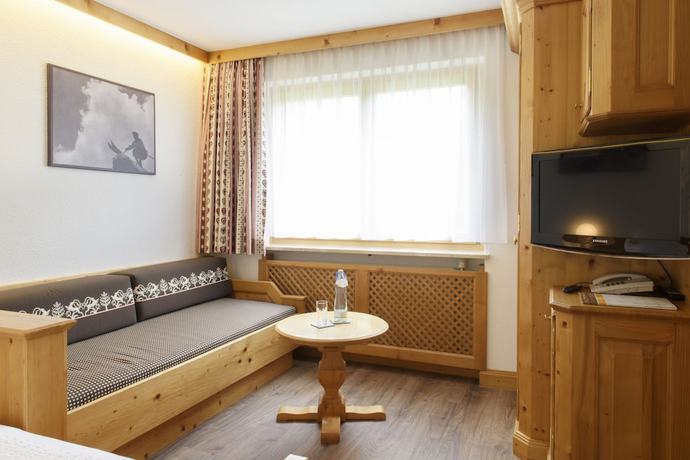 Imagen de la habitación del Hotel Gasthof Pension Wulfenia. Foto 12