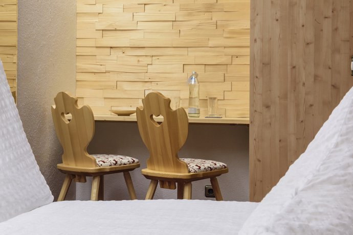 Imagen de la habitación del Hotel Gasthof Pension Wulfenia. Foto 16