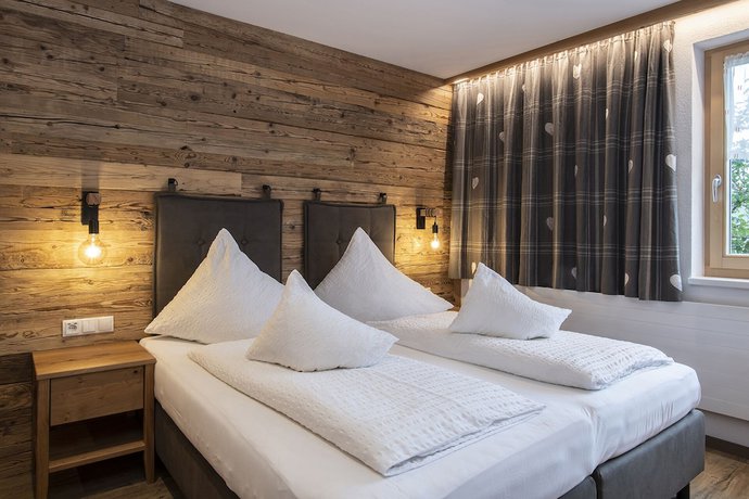 Imagen de la habitación del Hotel Gasthof Pension Wulfenia. Foto 17