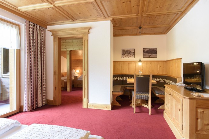 Imagen de la habitación del Hotel Gasthof Pension Wulfenia. Foto 18