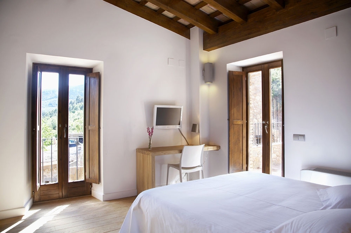 Imagen de la habitación del Hotel Gastronómico Mas Mariassa. Foto 9