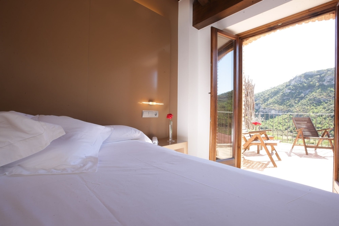 Imagen de la habitación del Hotel Gastronómico Mas Mariassa. Foto 12