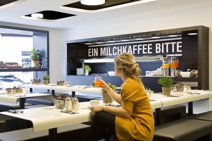 Imagen del bar/restaurante del Hotel Gat Point Charlie Berlin. Foto 3