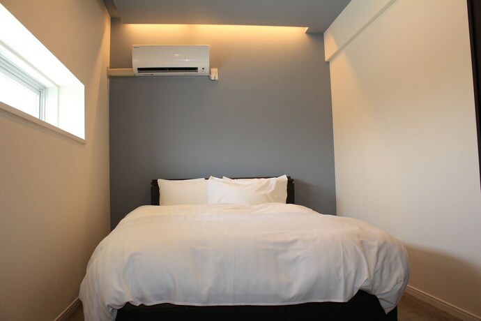 Imagen de la habitación del Hotel Gate Inn Nago. Foto 20