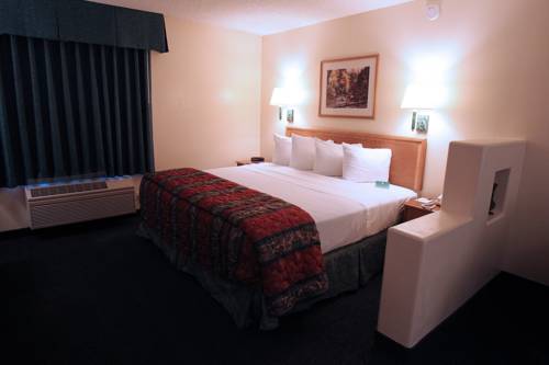 Imagen de la habitación del Hotel Gateway Studio Suites. Foto 11