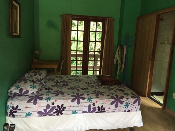 Imagen de la habitación del Hotel Gato de Botas Flats and Suites. Foto 4
