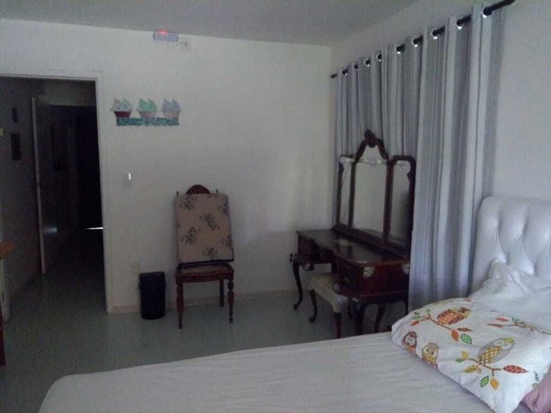 Imagen de la habitación del Hotel Gato de Botas Flats and Suites. Foto 5