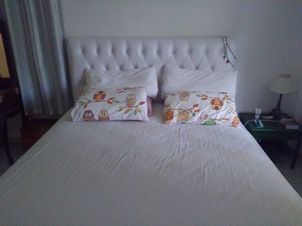 Imagen de la habitación del Hotel Gato de Botas Flats and Suites. Foto 6