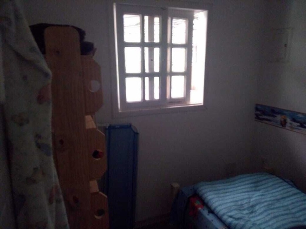 Imagen de la habitación del Hotel Gato de Botas Flats and Suites. Foto 9
