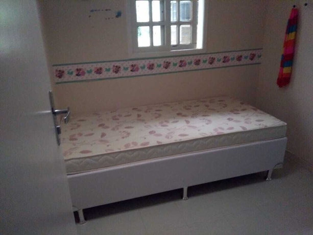 Imagen de la habitación del Hotel Gato de Botas Flats and Suites. Foto 10