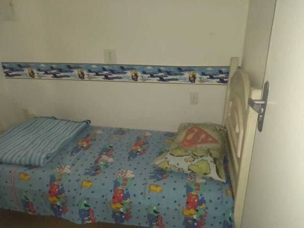 Imagen de la habitación del Hotel Gato de Botas Flats and Suites. Foto 11