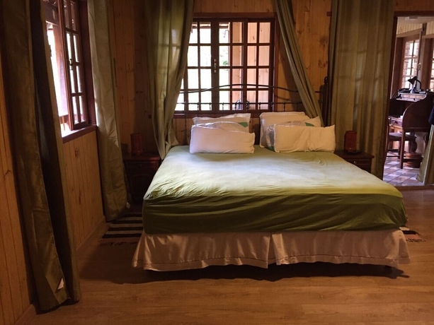 Imagen de la habitación del Hotel Gato de Botas Flats and Suites. Foto 12