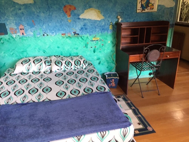 Imagen de la habitación del Hotel Gato de Botas Flats and Suites. Foto 15