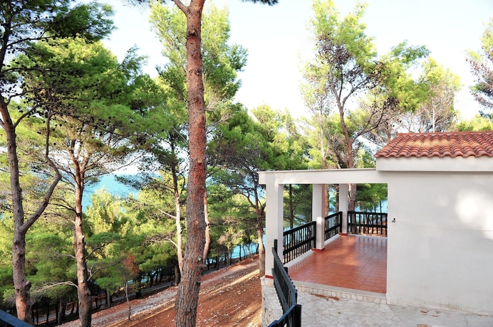 Imagen de la habitación del Hotel Gattarella Family Resort - Self-catering Accommodations In The Pinewood. Foto 5