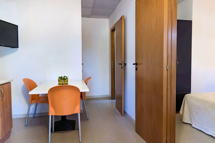 Imagen de la habitación del Hotel Gattarella Family Resort - Self-catering Accommodations In The Pinewood. Foto 6