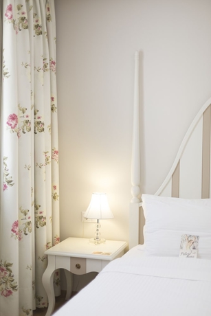 Imagen de la habitación del Hotel Gatto Perso Luxury Apartments. Foto 17