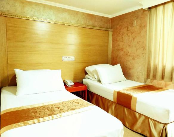 Imagen de la habitación del Hotel Gau Shan Ching Hotel. Foto 7