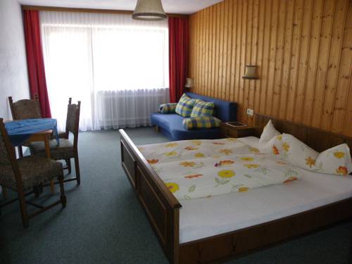 Imagen de la habitación del Hotel G&auml;stehaus Berghof Sch&ouml;pf. Foto 7