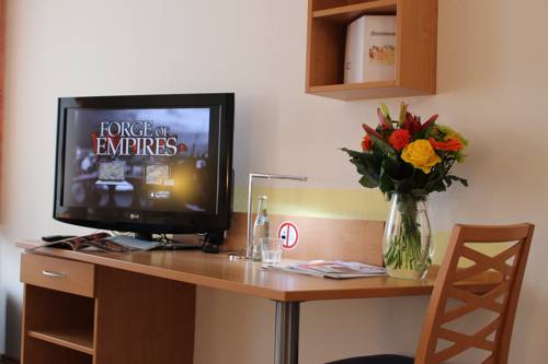 Imagen de la habitación del Hotel Gästehaus Centro. Foto 2