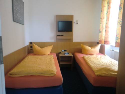 Imagen de la habitación del Hotel Gästehaus Centro. Foto 10