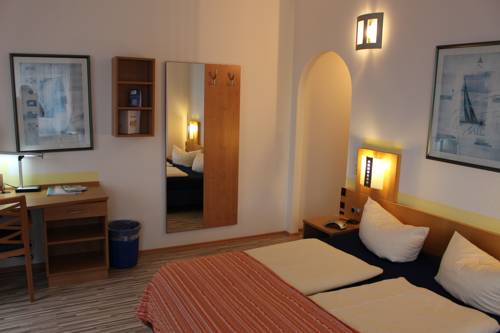 Imagen de la habitación del Hotel Gästehaus Centro. Foto 12