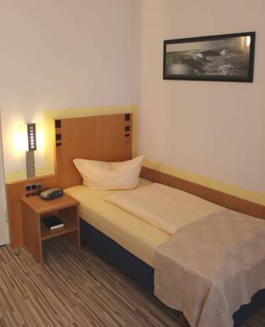 Imagen de la habitación del Hotel Gästehaus Centro. Foto 16